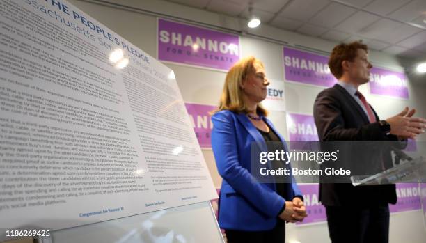 Two of three Massachusetts candidates for U.S. Senate, Shannon Liss-Riordan and Congressman Joe Kennedy III, jointly sign the People's Pledge, which...