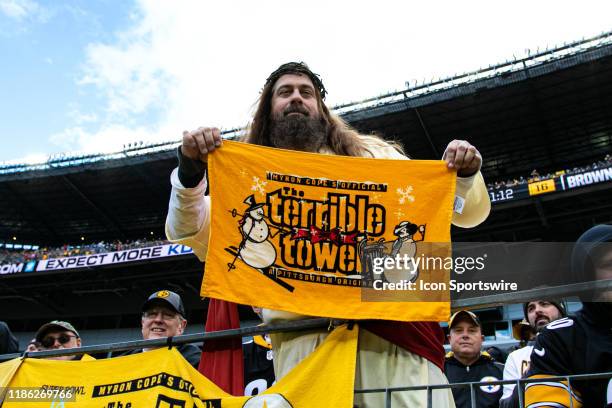Steelers fan dressed as Jesus holds a terrible towel during the NFL football game between the Cleveland Browns and the Pittsburgh Steelers on...
