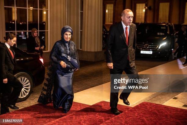 President of Turkey Recep Tayyip Erdogan and his wife Emine arrive at a reception for NATO leaders hosted by Queen Elizabeth II at Buckingham Palace...