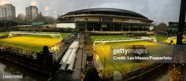 November 27: Mobile lighting rigs being deployed on some of the tennis courts at Wimbledon, the home of the All England Lawn Tennis & Croquet Club,...