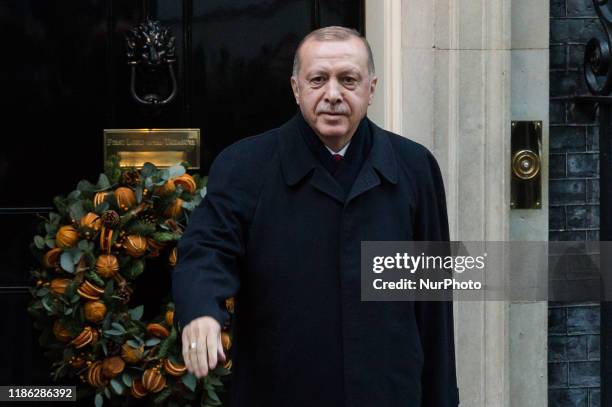 Turkish President Recep Tayyip Erdogan arrives at 10 Downing Street to attend a meeting between leaders of Germany, France and Turkey hosted by Prime...