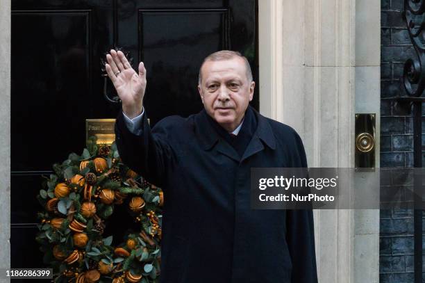 Turkish President Recep Tayyip Erdogan arrives at 10 Downing Street to attend a meeting between leaders of Germany, France and Turkey hosted by Prime...