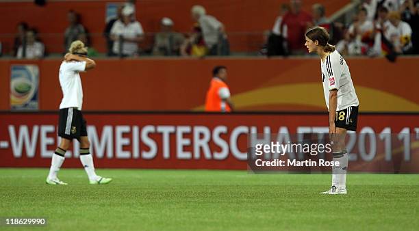 Kerstin Garefrekes of Germany looks dejected after the FIFA Women's World Cup 2011 Quarter Final match match between Germany and Japan at Wolfsburg...