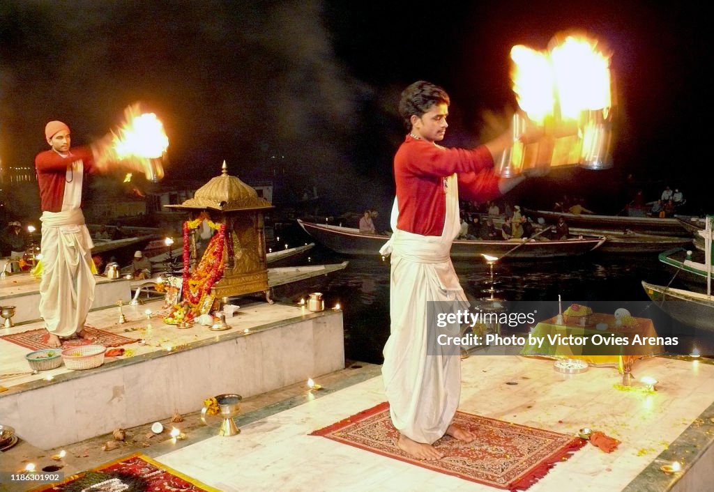 Mother Ganga Aarti religious ceremony in front of the Ganges river at night in Varanasi, Uttar Pradesh, India