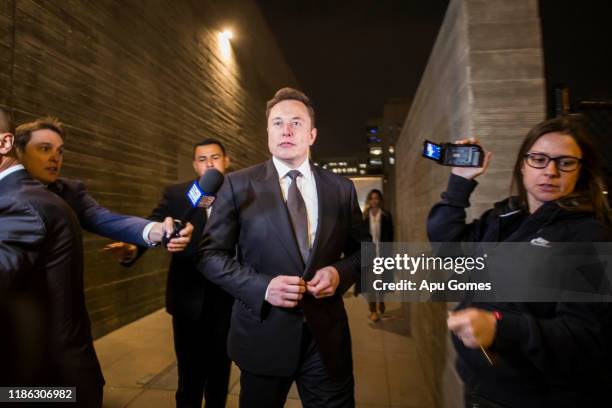 Elon Musk, chief executive officer of Tesla Inc. Leaves the US District Court, Central District of California through a back door in Los Angeles,...
