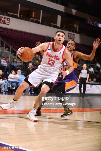 Matt Mooney of the Memphis Hustle drives against ShawnDre Jones of the Northern Arizona Suns on December 3 at the Findlay Toyota Center in Prescott...