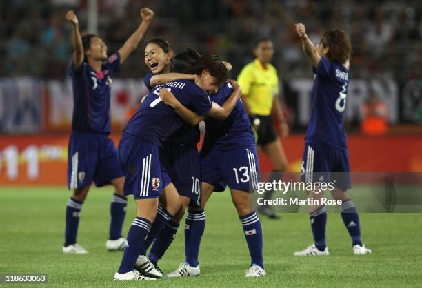 Homare Sawa of Japan celebrate with her team mates after the FIFA Women's World Cup 2011 Quarter Final match match between Germany and Japan at...