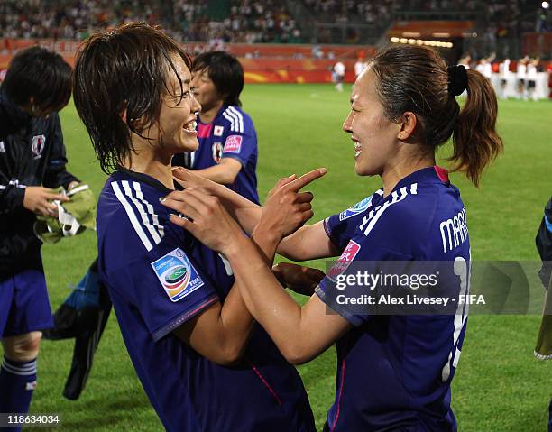 Winning goalscorer Karina Maruyama of Japan celebrates with Kozue Ando after victory over Germany in the FIFA Women's World Cup Quarter Final match...