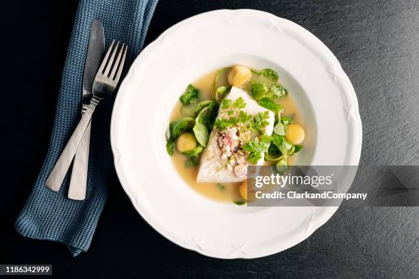 cod fillet with beurre blanc sauce and apple. - fish dish stock pictures, royalty-free photos & images