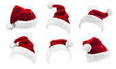 Set of Red Santa Claus Hats Isolated