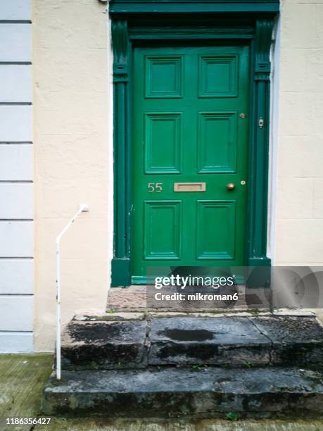 english green front, door - 2nd street stock pictures, royalty-free photos & images