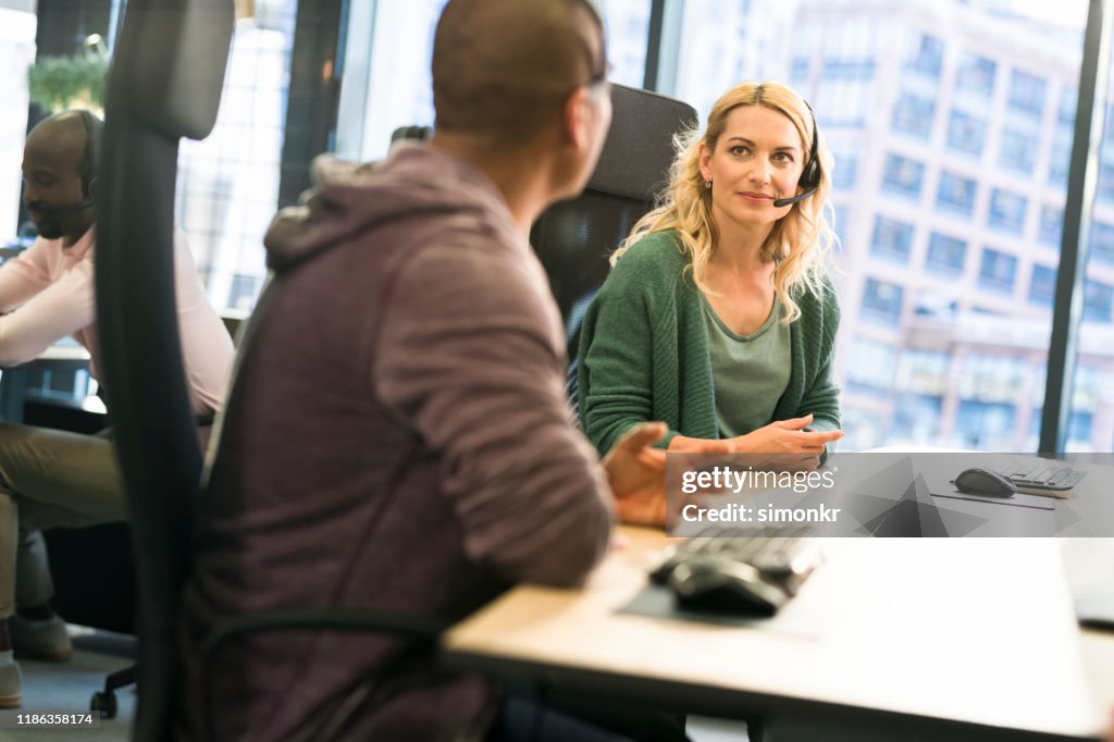 Customer service representative working in call centre