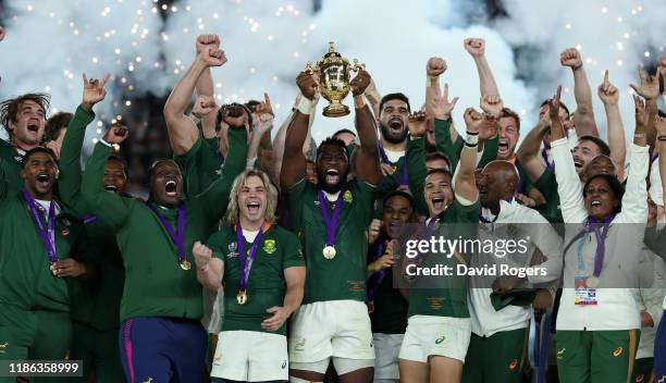 Siya Kolisi, the South Africa captain, raises the Webb Ellis Cup after their victory during the Rugby World Cup 2019 Final between England and South...