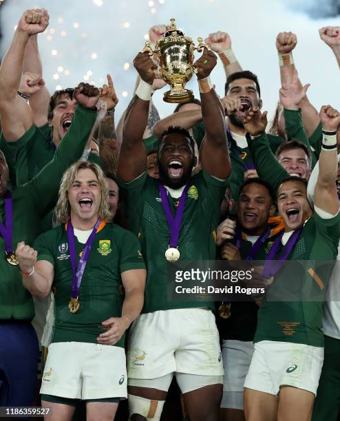 Siya Kolisi, the South Africa captain, raises the Webb Ellis Cup after their victory during the Rugby World Cup 2019 Final between England and South...