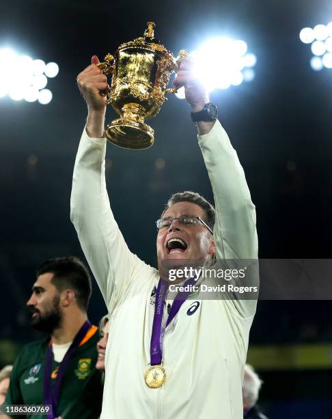 Rassie Erasmus, the South Africa head coach, holds aloft the Webb Ellis Cup after their victory during the Rugby World Cup 2019 Final between England...