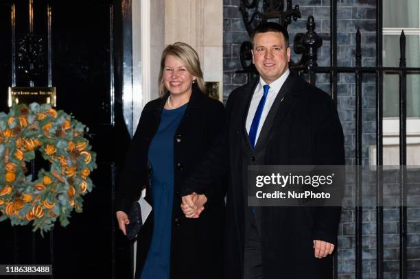 Prime Minister of Estonia Juri Ratas and his wife Karin Ratas arrive at 10 Downing Street to attend a reception for NATO leaders hosted by British...