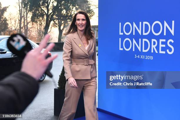 Prime Minister of Belgium, Sophie Wilmes arrives for the NATO summit at the Grove Hotel on December 4, 2019 in Watford, England. France and the UK...