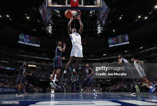 James Wiseman of the Memphis Tigers dunks the ball against the South Carolina State Bulldogs during a game on November 5, 2019 at FedExForum in...