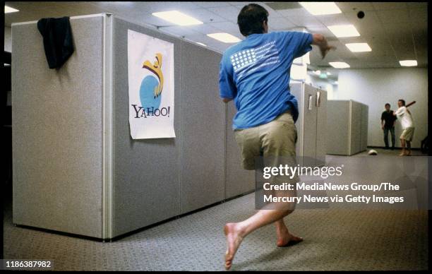 David Filo, one of the founders of Yahoo!, pitches to Eric Ng as Joonsuk Bae handles the catching chores. The three were taking a break at around...