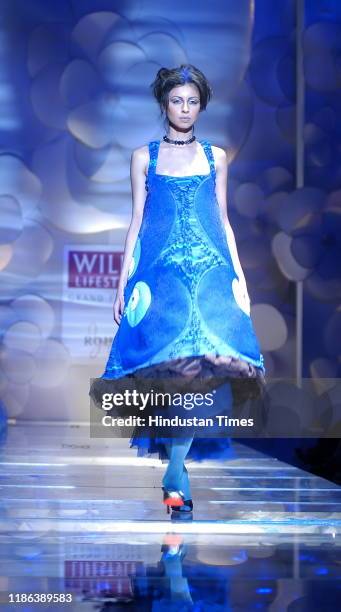 Model displays a creation by fashion designer Rohit Bal during the Wills Lifestyle India Fashion Week at Pragati Maidan, on September 7, 2007 in New...