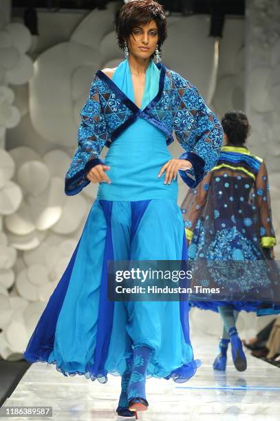 Model displays a creation by fashion designer Rohit Bal during the Wills Lifestyle India Fashion Week at Pragati Maidan, on September 7, 2007 in New...