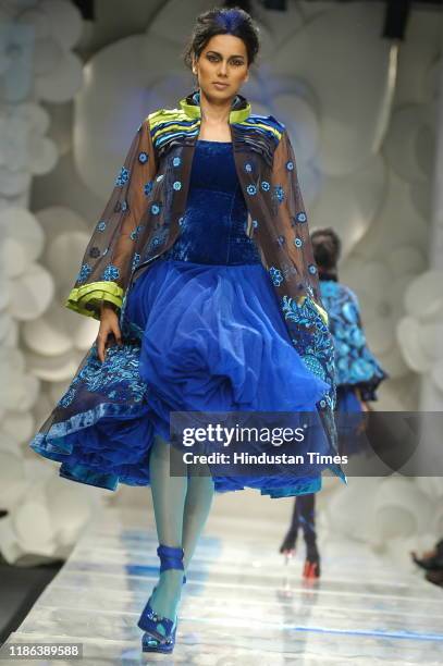 Model displays a creation by fashion designer Rohit Bal during the Wills Lifestyle India Fashion Week at Pragati Maidan, on September 7, 2007 in New...