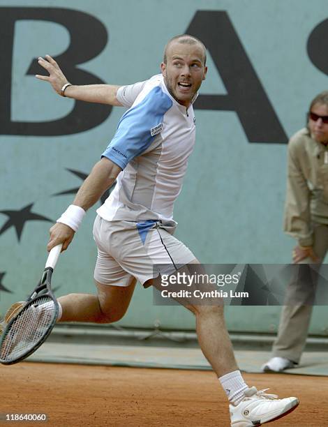 Olivier Rochus defeats Guillermo Garcia-Lopez at the 2005 French Open in Roland Garros Stadium on the May 24, 2005.