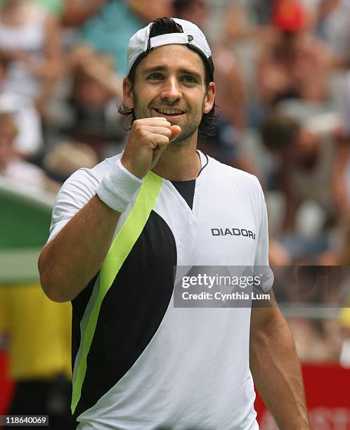 Nicolas Kiefer defeats Juan Ignacio Chela 7-6 , 6-3, 6-3 to move into the quarter-final at the Australian Open, Melbourne, Australia