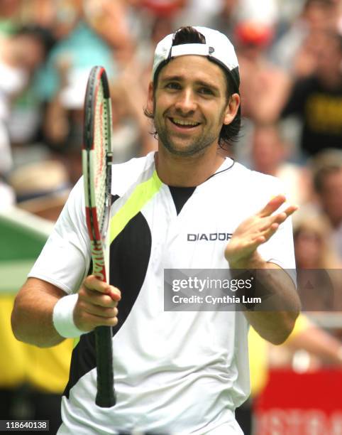 Nicolas Kiefer defeats Juan Ignacio Chela 7-6 , 6-3, 6-3 to move into the quarter-final at the Australian Open, Melbourne, Australia