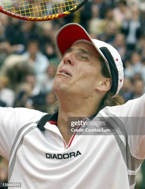 Gaston Gaudio upset 8th seed David Nalbandian 6-3, 7-6, 6-0 to earn a place in the final at Roland Garros