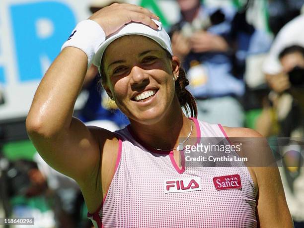 Jennifer Capriati celebrates her win after a hard-won 3-set come from behind match against Martina Hingis, 4-6, 7-6, 6-2, in the Australian Open...