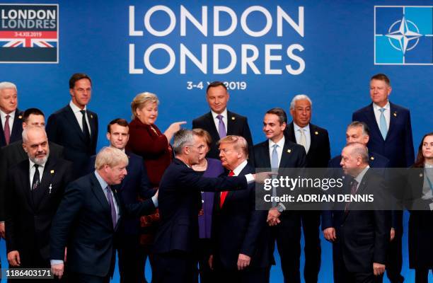 Secretary General Jens Stoltenberg gestures as Nato heads of government : Albania's Prime Minister Edi Rama, Britain's Prime Minister Boris Johnson,...