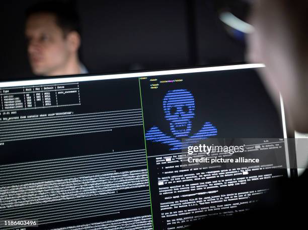 December 2019, Hessen, Darmstadt: IT security scientists are training in the "Cyber Range" room in the new "Athene" cyber security centre how...