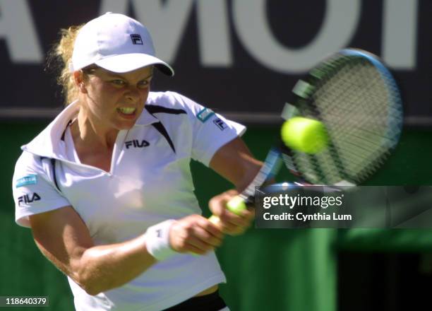 Kim Clijsters battles against Serena Williams during her loss to Williams in the semi-finals of Australian Open 2003.