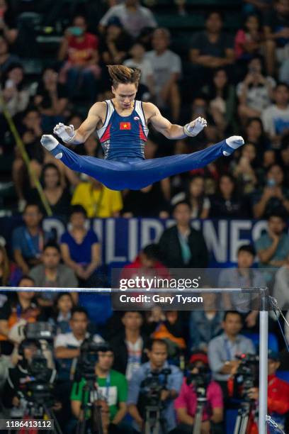 Dinh Phuong Thanh from Vietnam takes the Gold Medal in the Mens Horizontal Bars Final of the Southeast Asian Games on December 04, 2019 in Manila,...