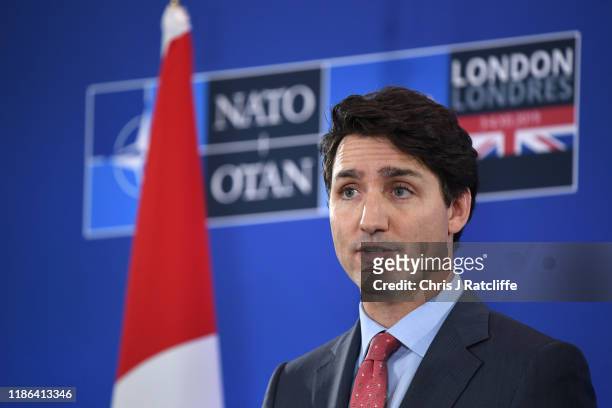 Canadian Prime Minister Justin Trudeau gives a press conference in the media centre at the NATO summit held in the Grove hotel in on December 4, 2019...
