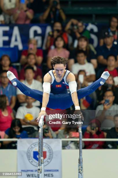 Dinh Phuong Thanh from Vietnam takes the Gold in the Parallel Bars Mens Final of the Southeast Asian Games on December 04, 2019 in Manila,...