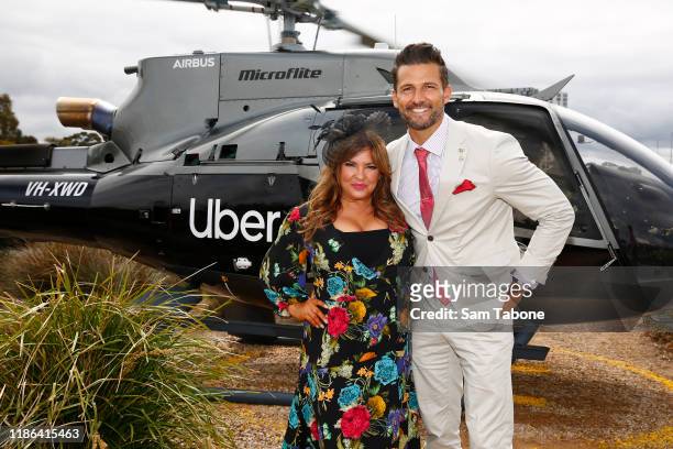 Rebekah Elmaloglou and Tim Robards arrive at Seppelt Wines Stakes Day at Flemington Racecourse on November 09, 2019 in Melbourne, Australia.