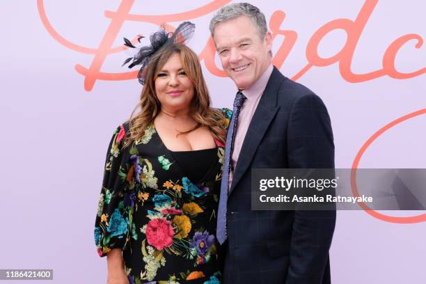 Rebekah Elmaloglou and Stefan Dennis attend Stakes Day at Flemington Racecourse on November 09, 2019 in Melbourne, Australia.