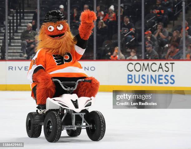 Gritty, the mascot of the Philadelphia Flyers entertains the crowd during the second period intermission against the Carolina Hurricanes on November...