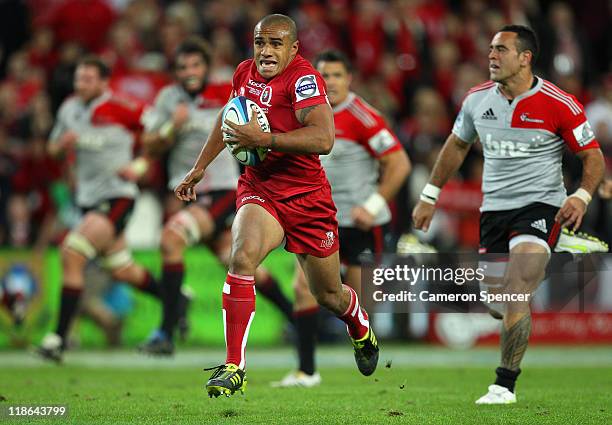 Will Genia of the Reds makes a break during the 2011 Super Rugby Grand Final match between the Reds and the Crusaders at Suncorp Stadium on July 9,...