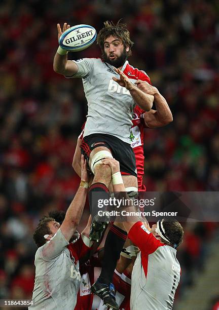 Sam Whitelock of the Crusaders takes a lineout ball during the 2011 Super Rugby Grand Final match between the Reds and the Crusaders at Suncorp...