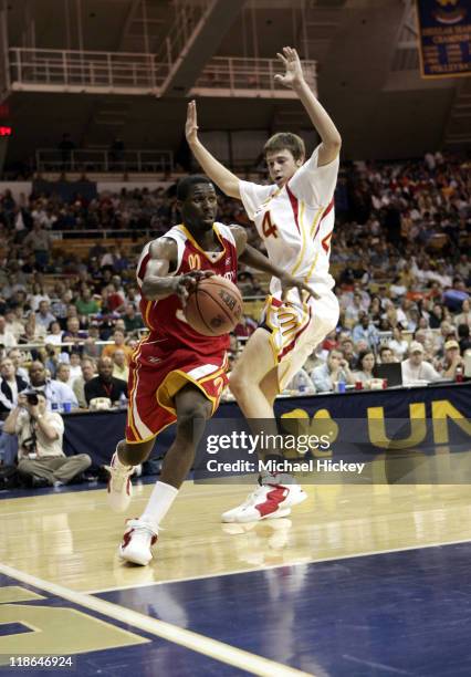 Julian Wright of Chicago Heights, IL and Josh McRoberts of Carmel, IN play in the McDonalds All American High School Basketball game at the Joyce...