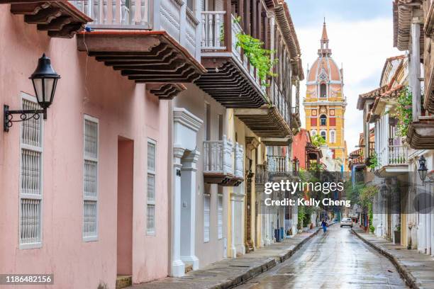 colourful street of historic cartagena - cartagena de indias stock pictures, royalty-free photos & images