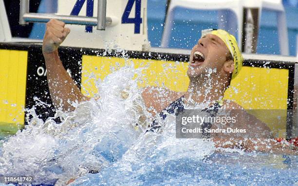 Grant Hackett of Australia celebrates the 800 meter Freestyle which he won in World Record Time in the XI Aquatic Fina World Championship in...