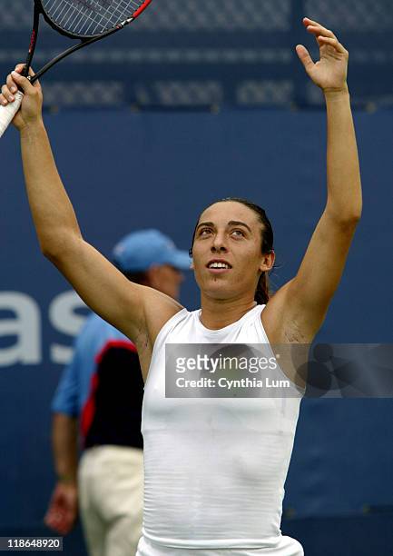 Francesca Schiavone, Italy, beats Ai Sugiyama, Japan, 6-7, 7-5, 6-2 at the 2003 US Open. The match had been rain delayed since Monday.