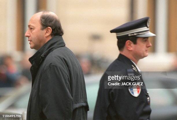 L'ancien Premier ministre socialiste, Laurent Fabius arrive, le 09 mars 1999 au Centre International de conférences, avenue Kléber à Paris. La Cour...
