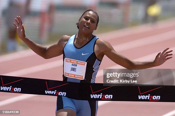 Marion Jones wins the 100 meters in a wind-aided 10.99 seconds in the Home Depot Invitational at the Home Depot Center on May 22, 2004.