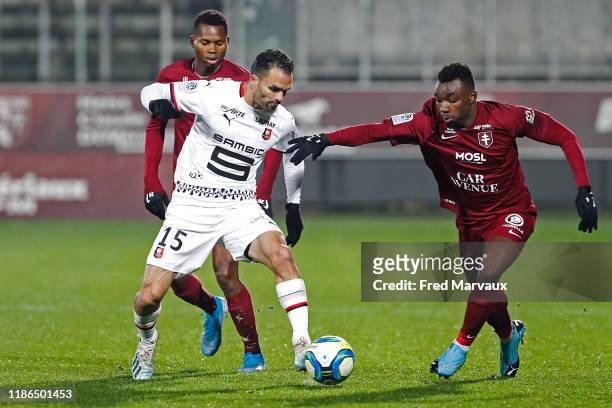 Jeremy Morel of Rennes and Thierry Ambrose of Metz during the Ligue 1 match between FC Metz and Rennes at Stade Saint-Symphorien on December 4, 2019...