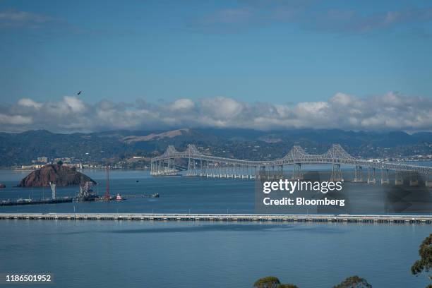 The Richmond-San Rafael Bridge stands in the San Francisco Bay as seen from Richmond, California, U.S., on Tuesday, Dec. 3, 2019. The city of...